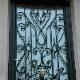 Porte d'entr&eacute;e en fer forg&eacute; type "Louis XV"